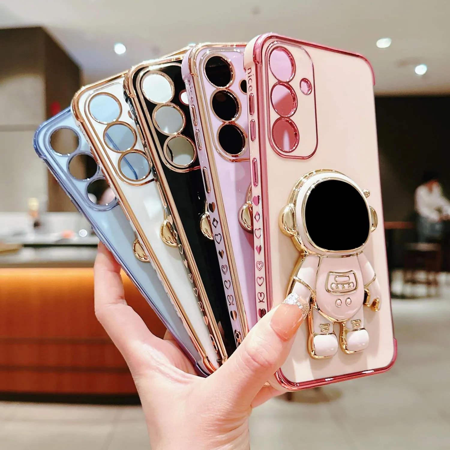 phylla Phone Case for Samsung Galaxy S25  Plus 5g 6.8",Luxury Plating Astronaut Stand Holder Case with Cute Love Heart Side Small Pattern Soft Silicone Shockproof Kickstand Cover Bumper (Purple)